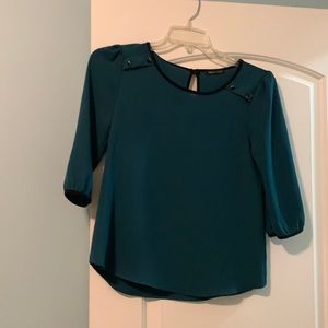 Dressy teal women’s blouse. Size small, Jella Couture brand.